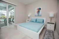 Spacious 4BR Escape with Heated Saltwater Pool & Hot Tub – Near Beaches & Golf