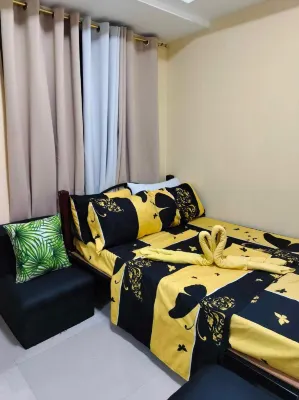 Spacious 1-Bedroom Condo in Quezon City with Private Pool Hotels near Holy Family Parish Church - West Kamias, Quezon City (Diocese of Cubao)