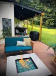 Luxury cottage with hot tub, game and movie room, coffee bar, King bed & robes!