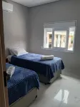 Cozy house 500m from the beach in Guarujá, pet friendly