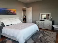 Large home on private penninsula with waterfront and views on three sides.