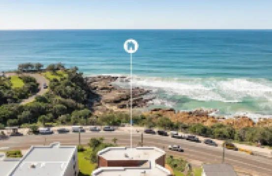 Contemporary beachfront apartment with breathtaking panoramic ocean views.