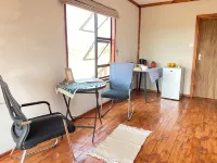 Cozy wooden cabin overlooking the foot of the Tswapong Hills in Palapye.