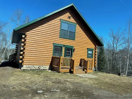 Log Cabin style lake house on Sea Lion Lake