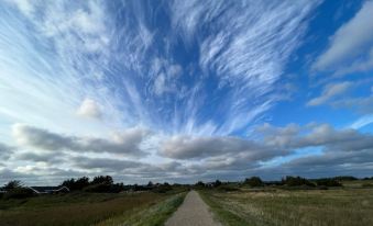 Charming Holiday Home in Blåvand with Hot Tub