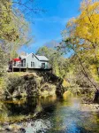 Peaceful Creek View Cottage~Walk to Town & at~Pet Friendly~Relax on the Porch