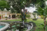 Villa Costa Sanur - سرير ووجبة إفطار