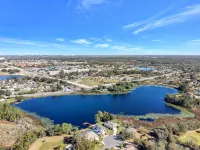 Luxe Lakefront Escape - Jacuzzi +Pool + Sunset Views + BBQ + Close to Disney!