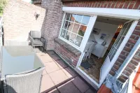 Tobi's Kajüte Freundliche Obergeschosswohnung in Norddeich für 4 Personen + Baby