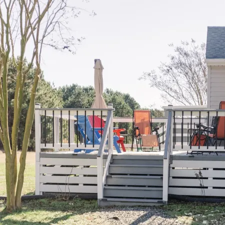 Newly Renovated, 4Bd 2 BA, 1 Full Acre, Sleeps 8, and is Pet Friendly.