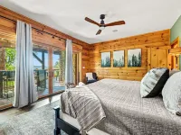 Stunning Views • Hot Tub • Sauna • Theater • Game Rooms • Sleep/Dine 23 •Firepit Hotels in Qualla