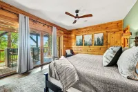 Stunning Views • Hot Tub • Sauna • Theater • Game Rooms • Sleep/Dine 23 •Firepit