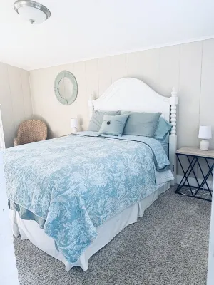 Right across from Beach and Grand Haven Pier!  Beautiful Lake and Sunset Views!