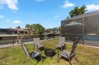 Crystal River Pool Home ~ Waterfront w/Boat Dock, Hot Tub & fenced backyard. Hotels near Withlacoochee Bay Trail. 10201 N Suncoast Blvd Crystal