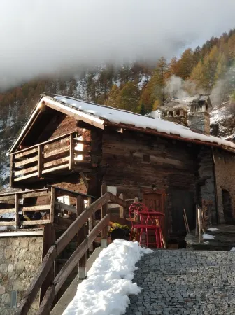 An ancient fairy-tale rascard, a chalet surrounded by nature