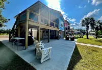 Cozy water front home with a swimming pool near beaches and Old Town BSL!