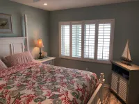 Completely remodeled beach front condo with full ocean views, steps to the water