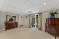 3 bedroom/2 full bath lakefront home with gentle slope to private covered dock