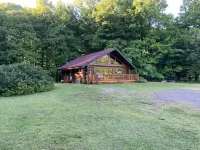 Serene Log Cabin Getaway! Close to Hiking, Snowmobile And Four Wheeler Trails.