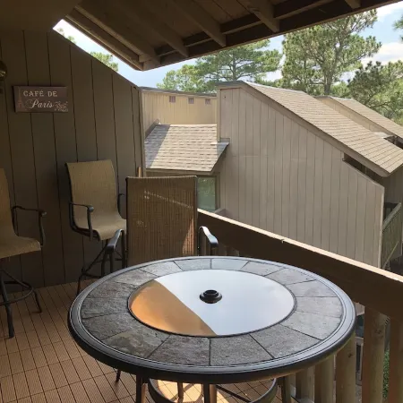 2 Br Condo on resort Property access to members benefits pool/hottub/golf cart