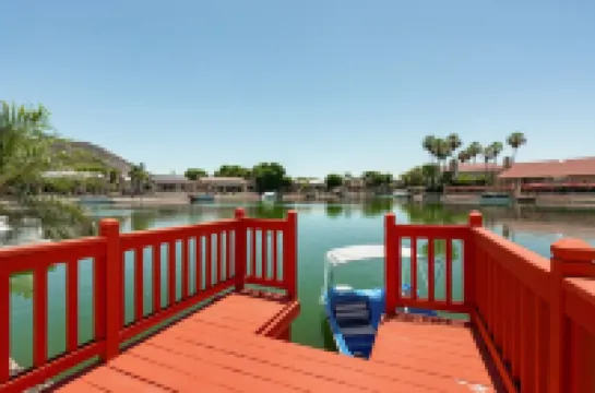 Lakefront Home complete with Mountain Views, Pool, Putting Green & Paddle Boat!