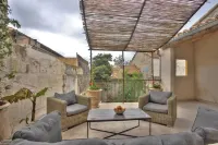 South-facing suite with terrace in town center