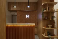 Hop Inn Rooms & Suites