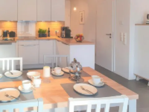Modern, spacious, comfort apartment on the ground floor for four people and a baby. Hotels in Greetsiel