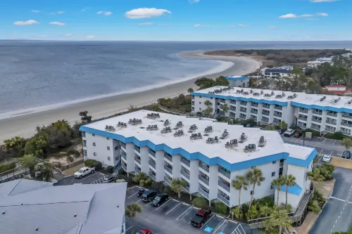 Private Balcony and Pool Access - Charming Ocean-View Getaway