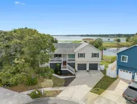 Heated Pool and Game Room Oasis - Stunning Waterfront Escape