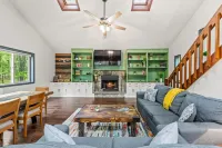 Lake Access and Expansive Deck - Charming Retreat with Cozy Fireplace