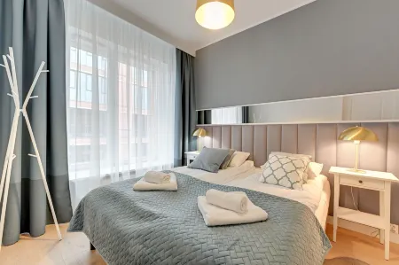 Comfort Apartments Rajska Отели рядом с достопримечательностью «Ректорская церковь отцов кармелитов Святой Екатерины»