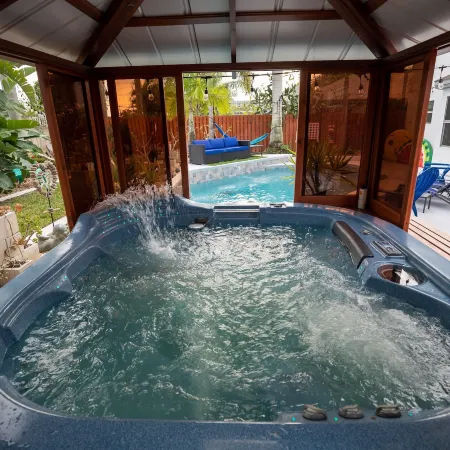 Gorgeous Urban Oasis W/Hot Tub, Heated Pool and Private Movie Theater 3 Bedroom Home by Redawning