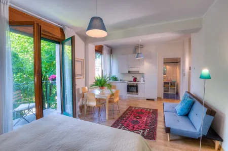 Rita's Garden Отели в г. Леньяно