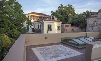 Tripodon Plaka in the Shade of Acropolis by Ghh