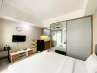 Homey and Cozy Stay Studio LRT City Jatibening Apartment Hotels in Pondok Gede