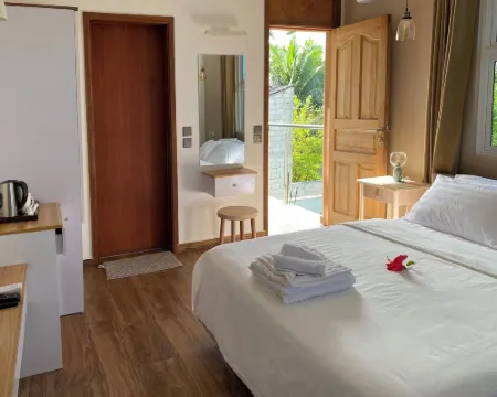 Calm Beach Inn Hotels in Gan