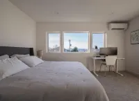 Steps to Alki Beach with Water Views Rooftop deck