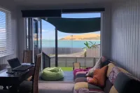 Stunning views with beach access across the road.