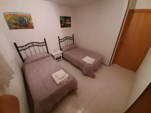 Elegant Benidorm apartment with pool, parking, and garden,