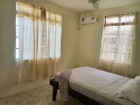 Comfortable, local home with A/C and private verandah Hotel a Calibishie