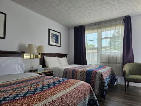 Motel de l'Outlet Отели в г. 