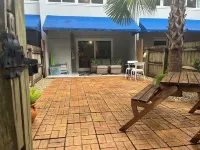 Family Friendly Condo minutes to beach w/ large pool and private outdoor space.