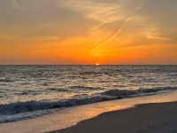 Family-friendly beachfront condo with pool and private lanai