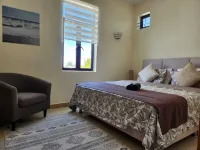 Cosy Penthouse vue mer et son Rooftop Privatif vue sur le Coin de Mire! Отели в г. Перейбера