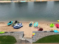 Sunset Lake Paradise new 4-bedroom lake house with private beach, WiFi, and AC