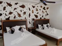 Sundown Resort & Austrian Pension House Hotel dekat Pantai Cagban