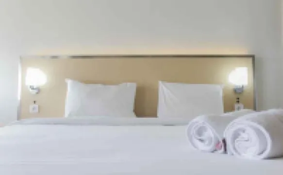 Comfort and Minimalist Studio at Parkland Avenue Apartment by Travelio