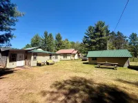 Waterfront Cabin w/ Private Dock & Outdoor Bar near Munising/Manistique - 2-Star