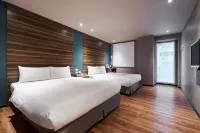 โรงแรมทูมอร์โรว์ - โรงแรมราคาถูก